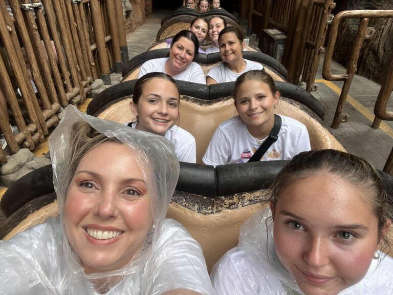 Friends riding Tiana’s Bayou Adventure and enjoying the drop.