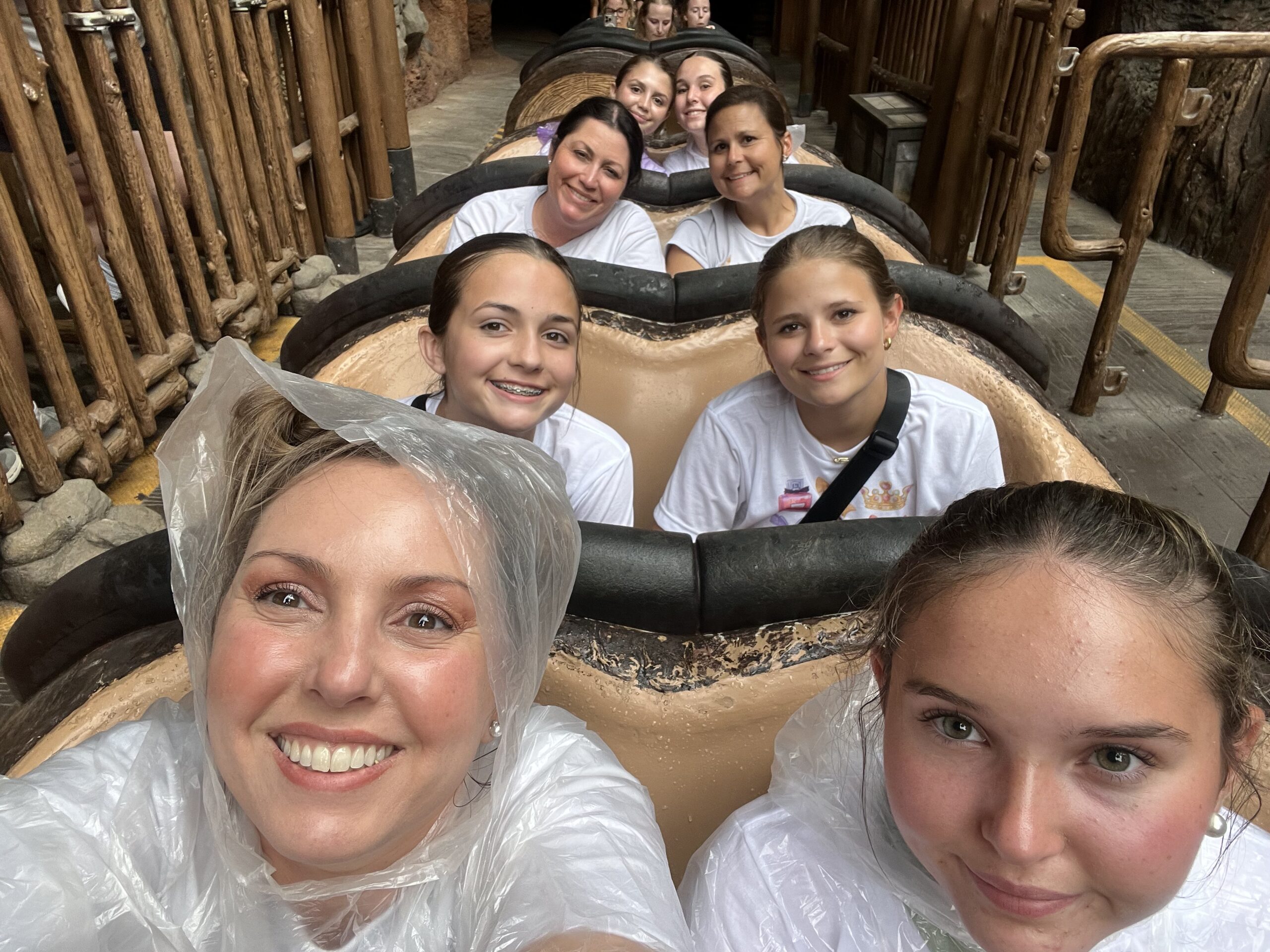 Friends riding Tiana’s Bayou Adventure and enjoying the drop.